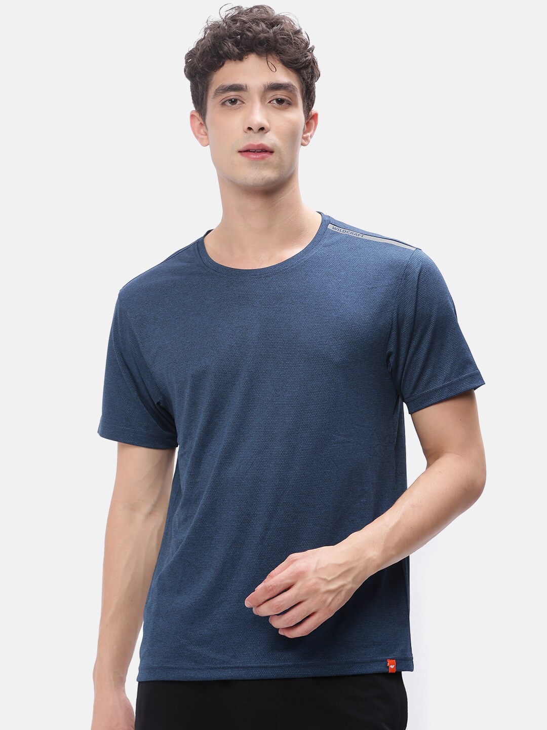 

Wildcraft Men Navy Blue Solid Round Neck T-shirt