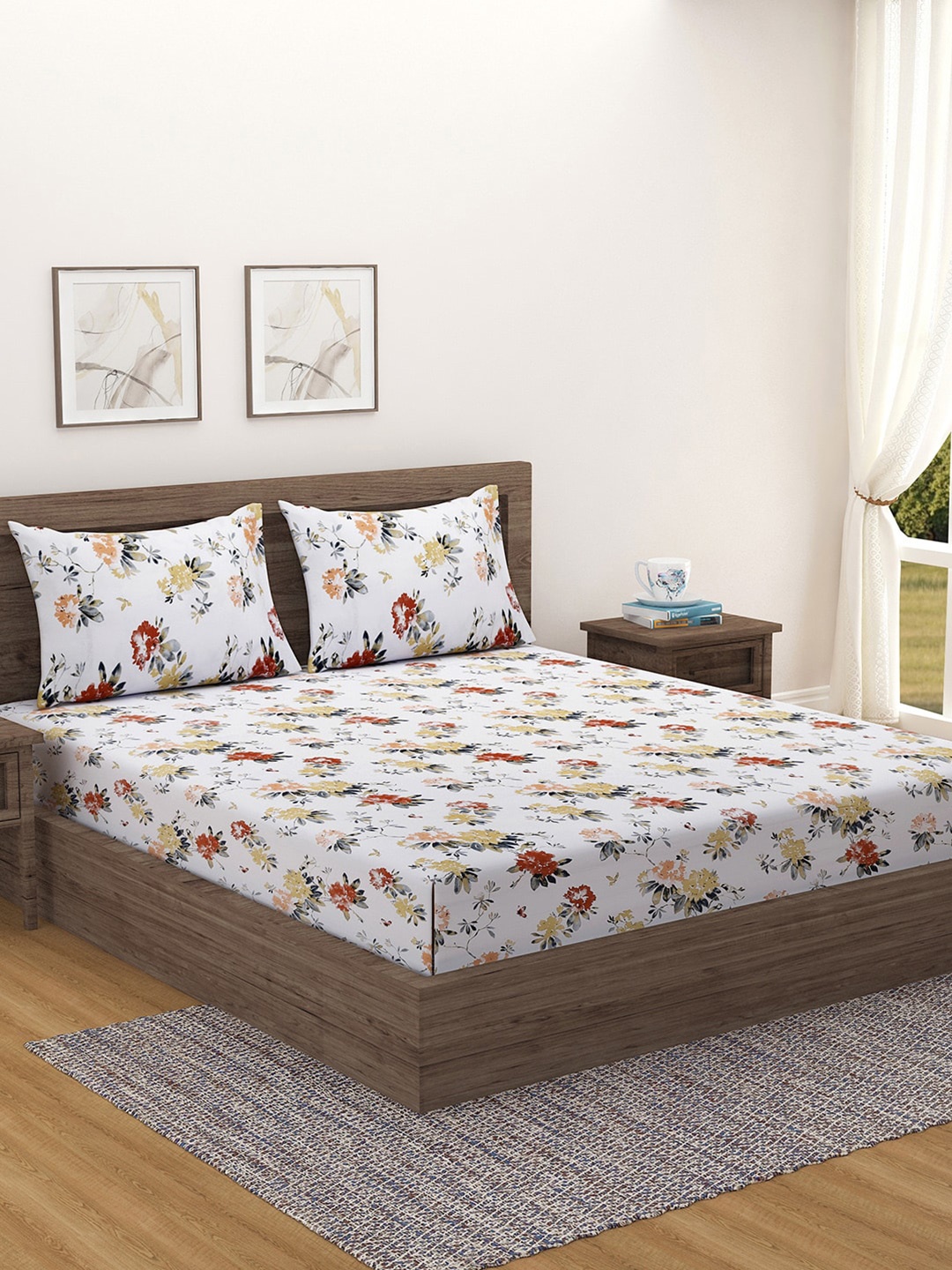 

Swayam Ananda Yellow Floral 210TC Pure Cotton Double Bedsheet Set with 2 Pillow Covers, White