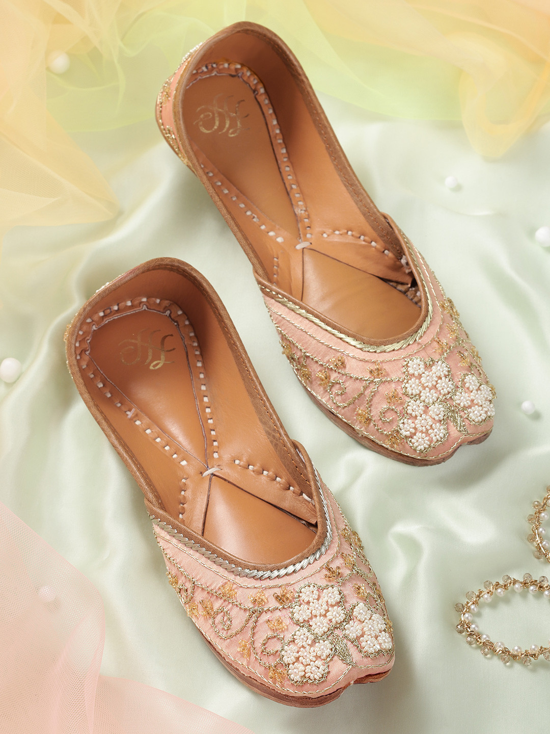 

House of Pataudi Women Peach-Coloured & Gold-Toned Handcrafted Embellished Leather Mojaris