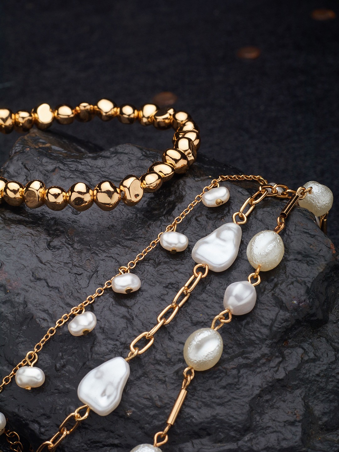 

Ami Women Gold Tone Set of 4 Contemporary Bracelets