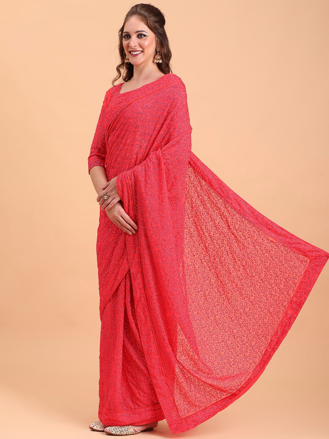 

Sangria Pink Woven Design Sequinned Pure Georgette Saree