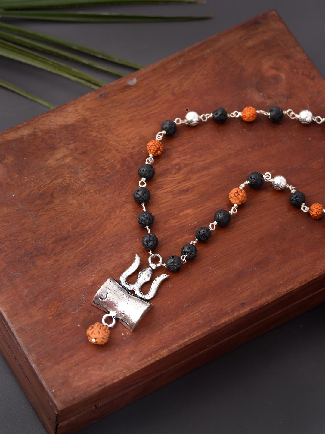 

Tistabene Men Black & Silver Alloy Silver-Plated Rudraksha & Lava Beads Trishool Necklace