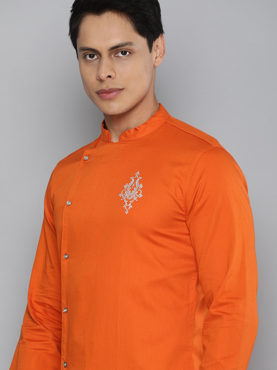 

The Indian Garage Co Men Orange & Golden Solid Pure Cotton Assymetric Hem Angrakha Kurta
