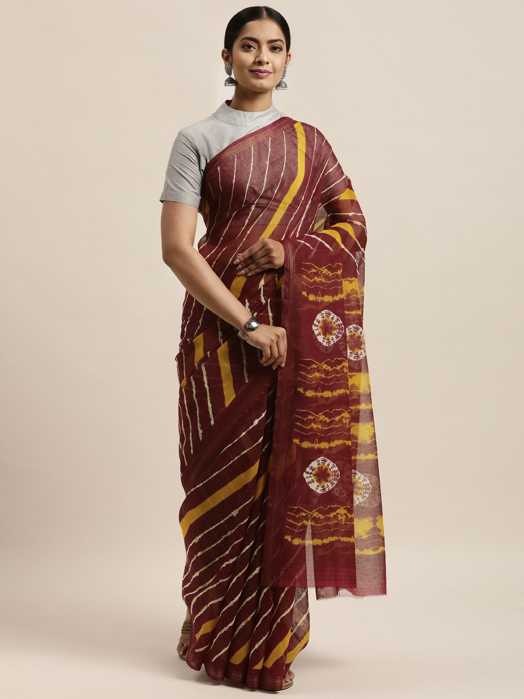 

aamna Maroon & Yellow Leheriya Printed Silk Cotton Ikat Saree