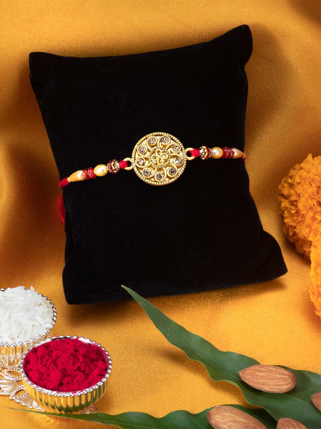 

Peora Gold-Toned and Pearl Rakhi with Raksha Bandhan Greeting Card & Roli Chawal