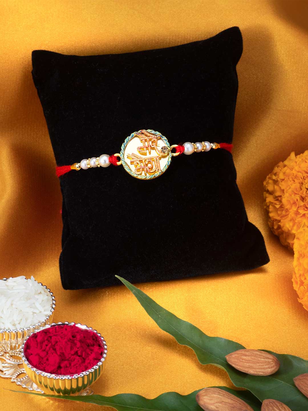 

Peora Men Gold-Toned & Red Stone-Studded & BeadedRakhi with Card & Roli Chawal