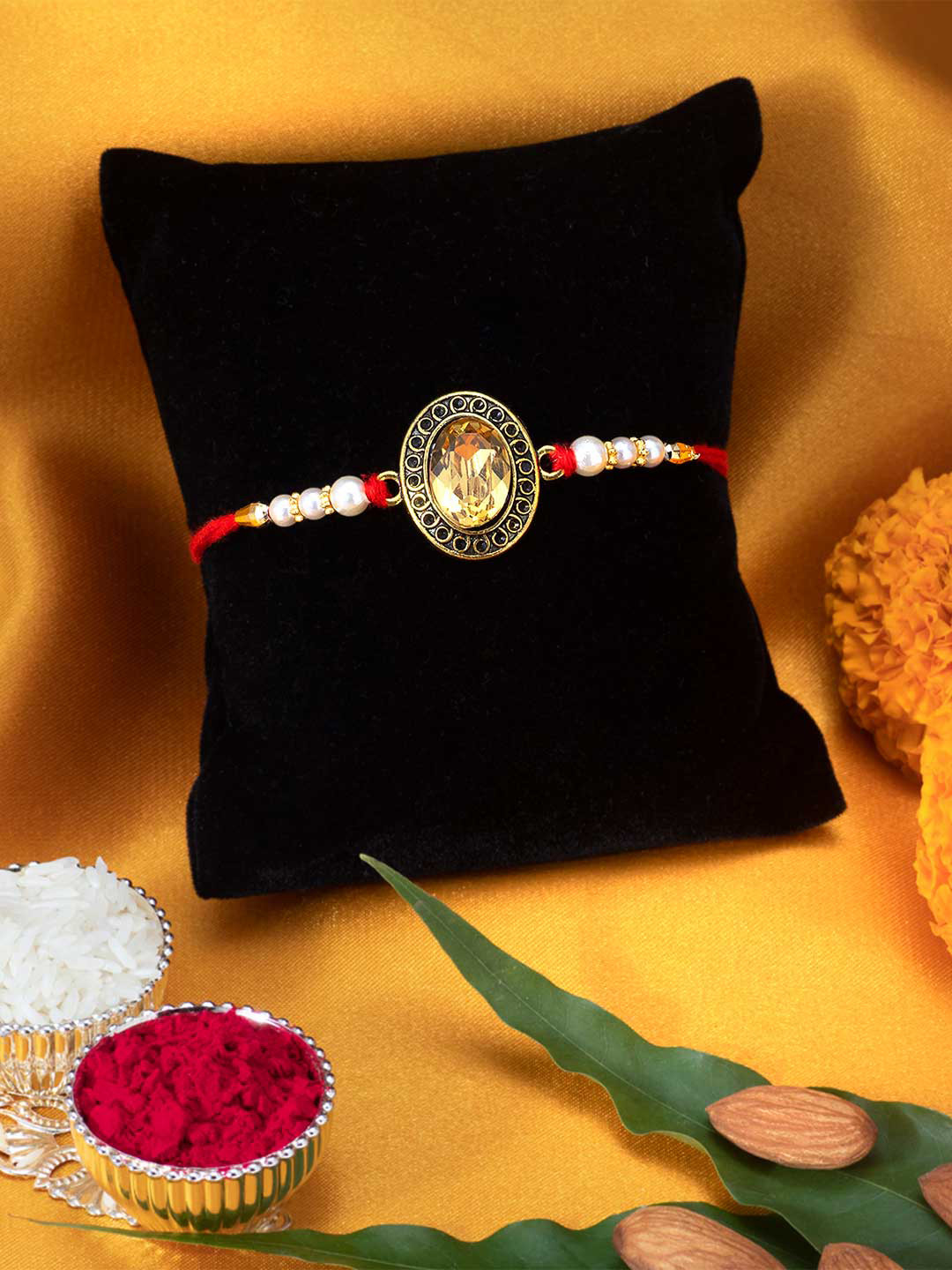 

Peora Red Crystal Stone Meenakari Rakhi With Greeting Card & Roli Chawal