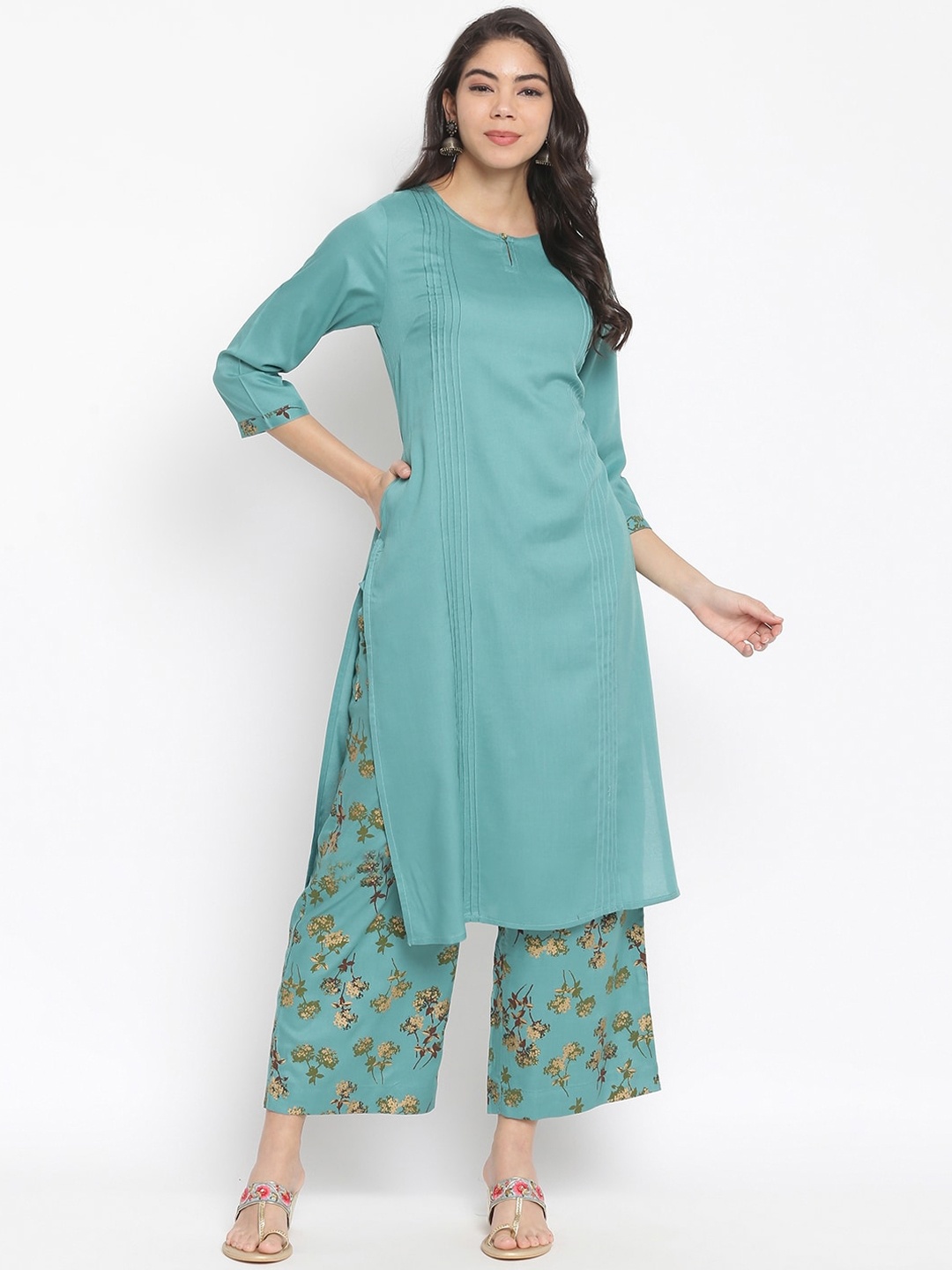 

IMARA Women Turquoise Blue Embroidered Pleated Liva Kurti with Palazzos