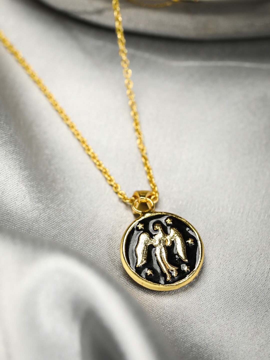 

Priyaasi Gold-Toned & Black Brass Gold-Plated Virgo Zodiac Sign Handcrafted Necklace