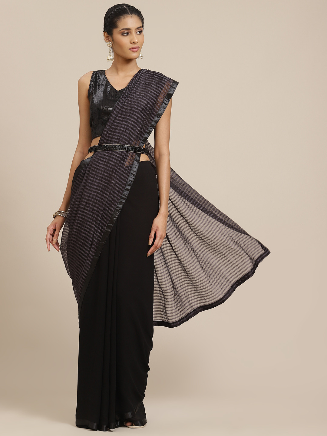 

Sangria Women Black Sequinned Half and Half Saree