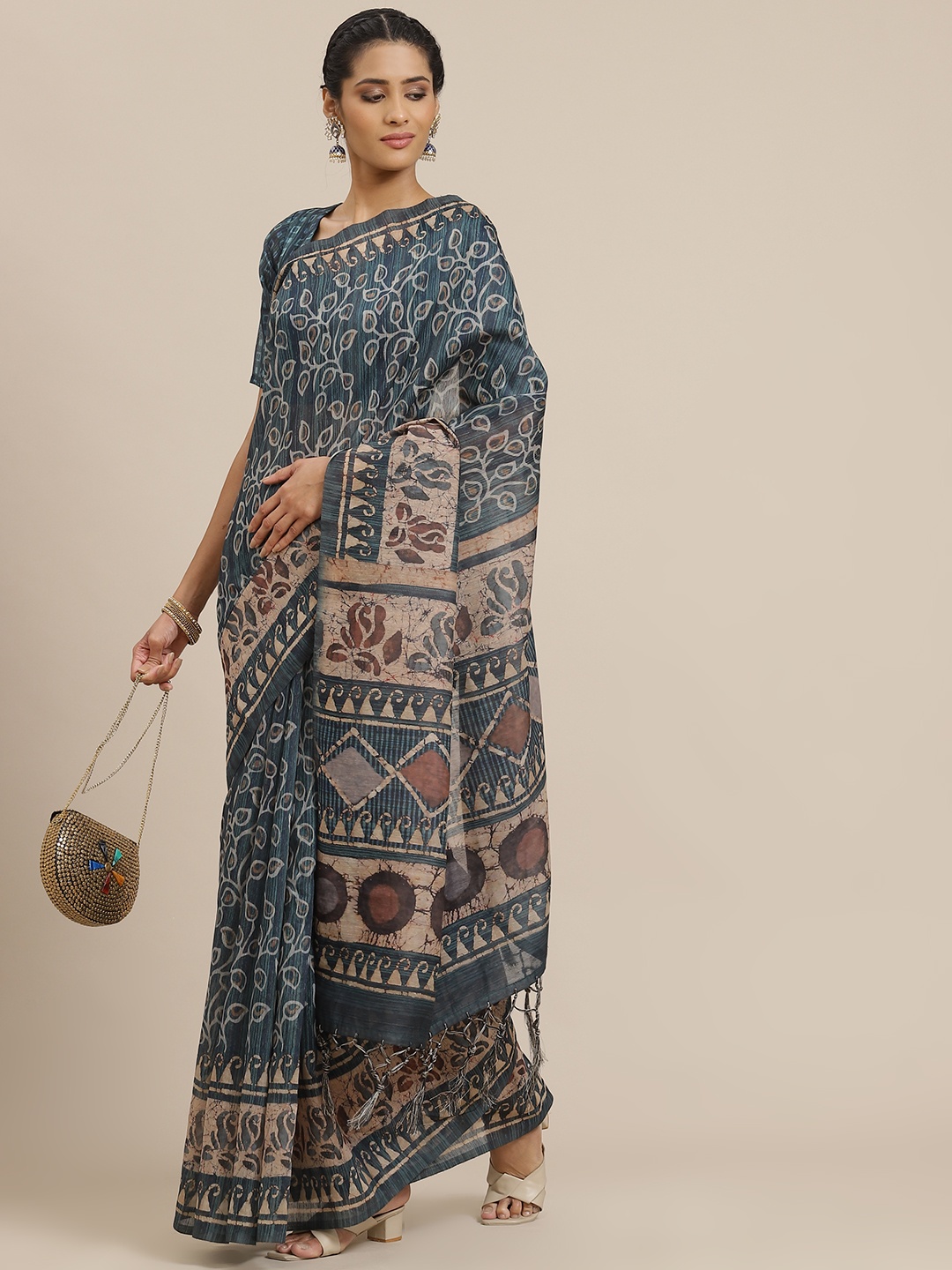 

Sangria Blue & Beige Ethnic Motifs Saree