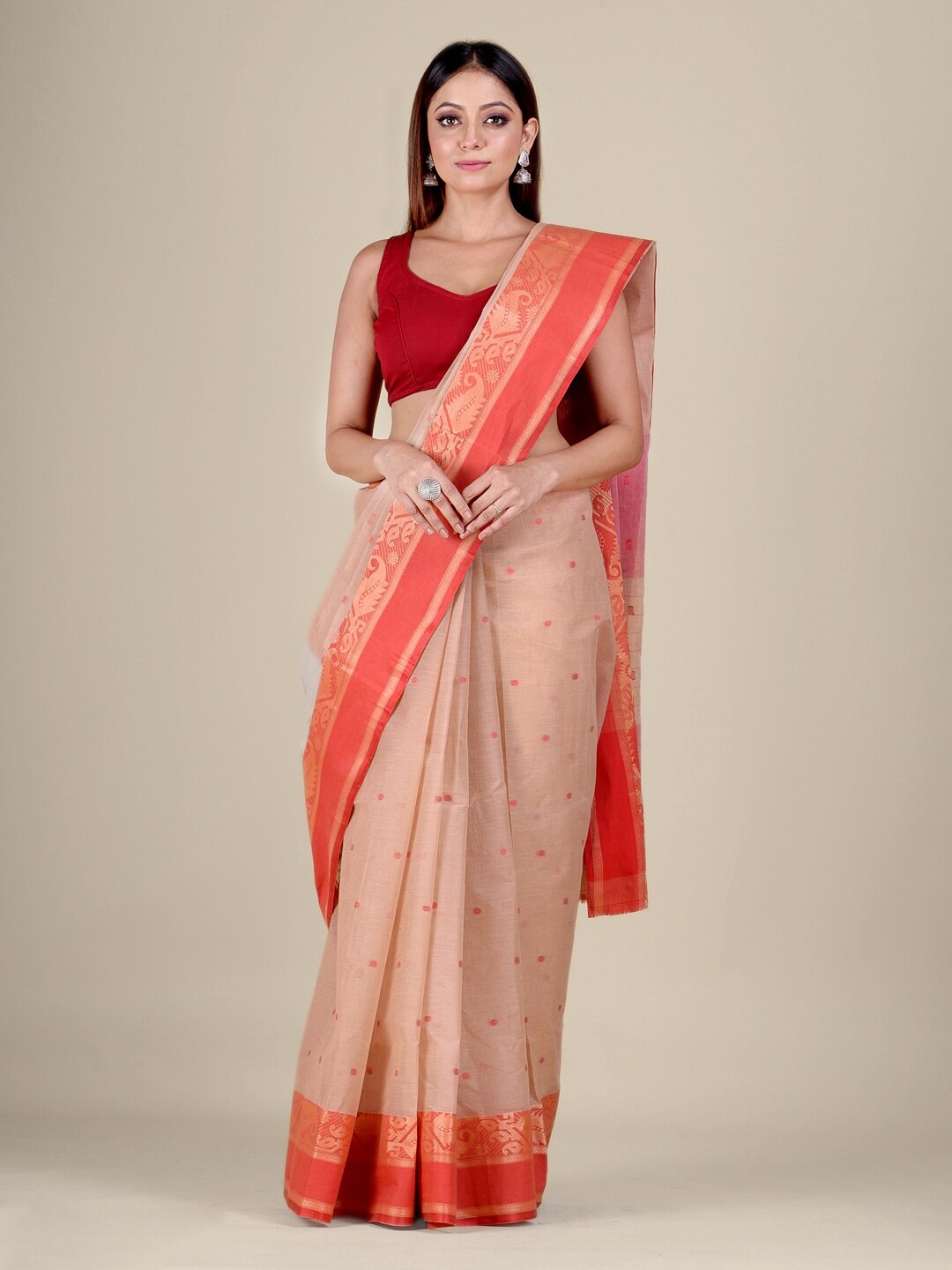 

Mitera Beige & Orange Ethnic Motifs Zari Pure Cotton Taant Saree