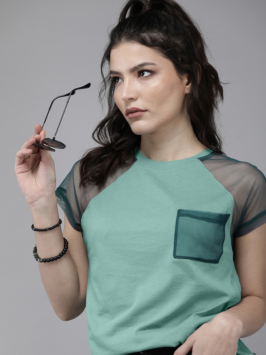 

Roadster Women Green Solid Raglan Sleeves Pocket Pure Cotton T-shirt