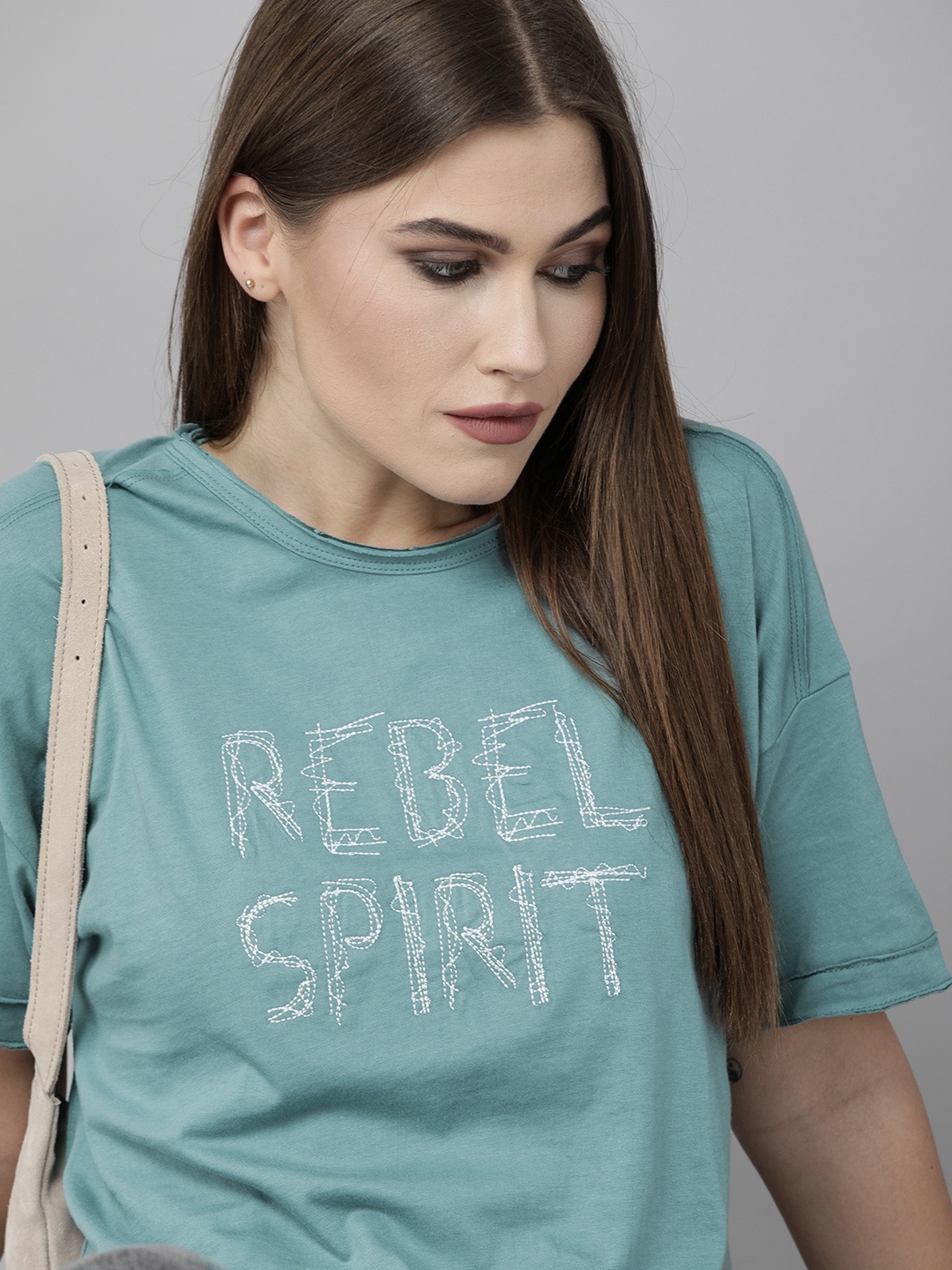 

Roadster Women Blue Typography Striped Extended Sleeves T-shirt
