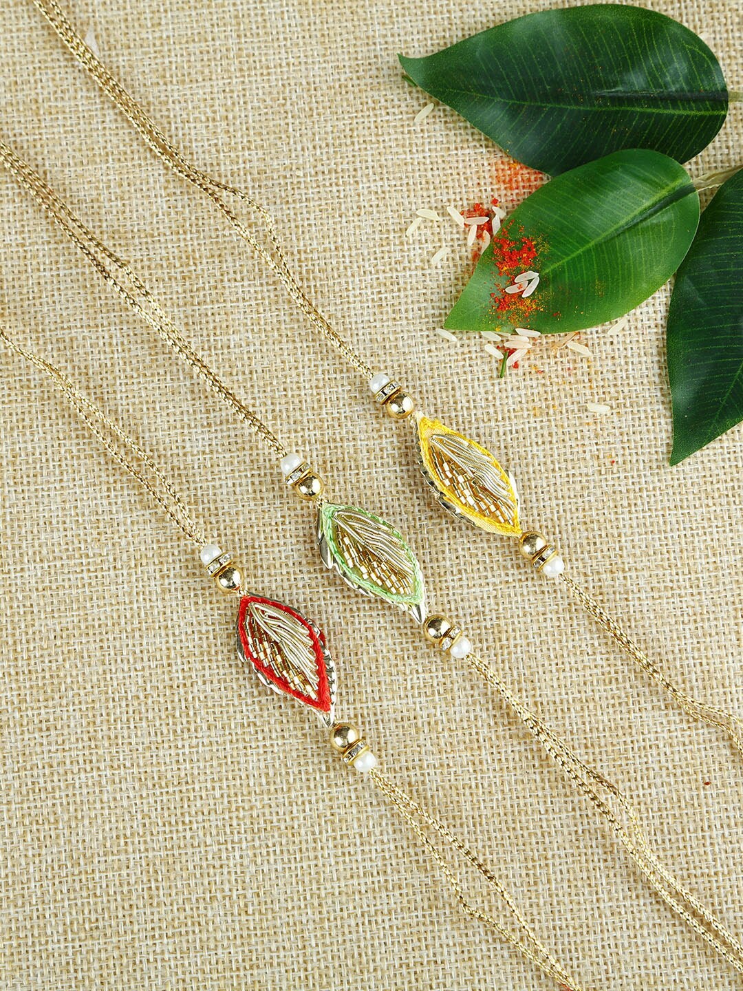 

Aapno Rajasthan 3 Pcs Multicoloured Handcrafted Rakhi, Multi