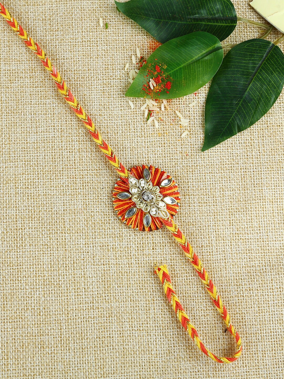 

Aapno Rajasthan Multicoloured Rakhi Gift Set, Red