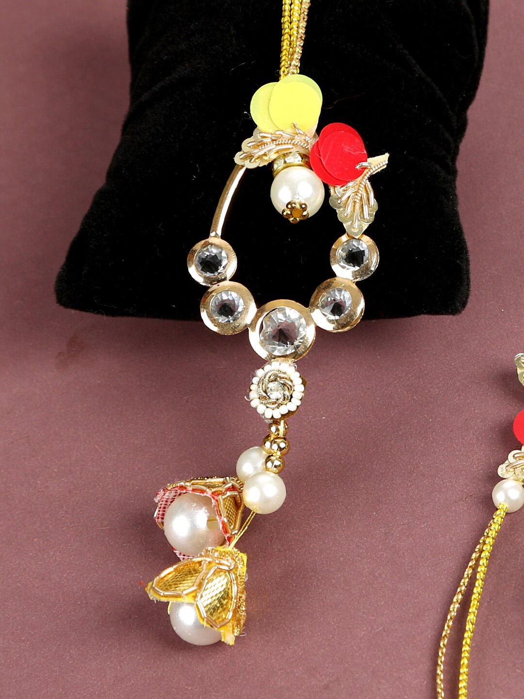 

Aapno Rajasthan Yellow & Red Handcrafted Adorned with Beads Bhaiya Bhabhi Rakhi Set