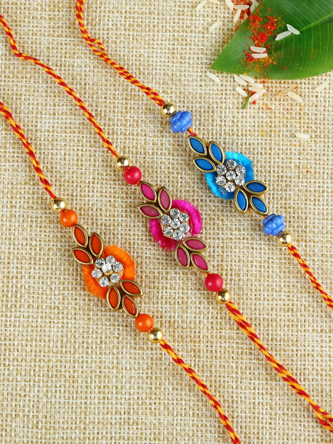 

Aapno Rajasthan Orange & Blue Set of 3 Handcrafted Beaded Rakhis