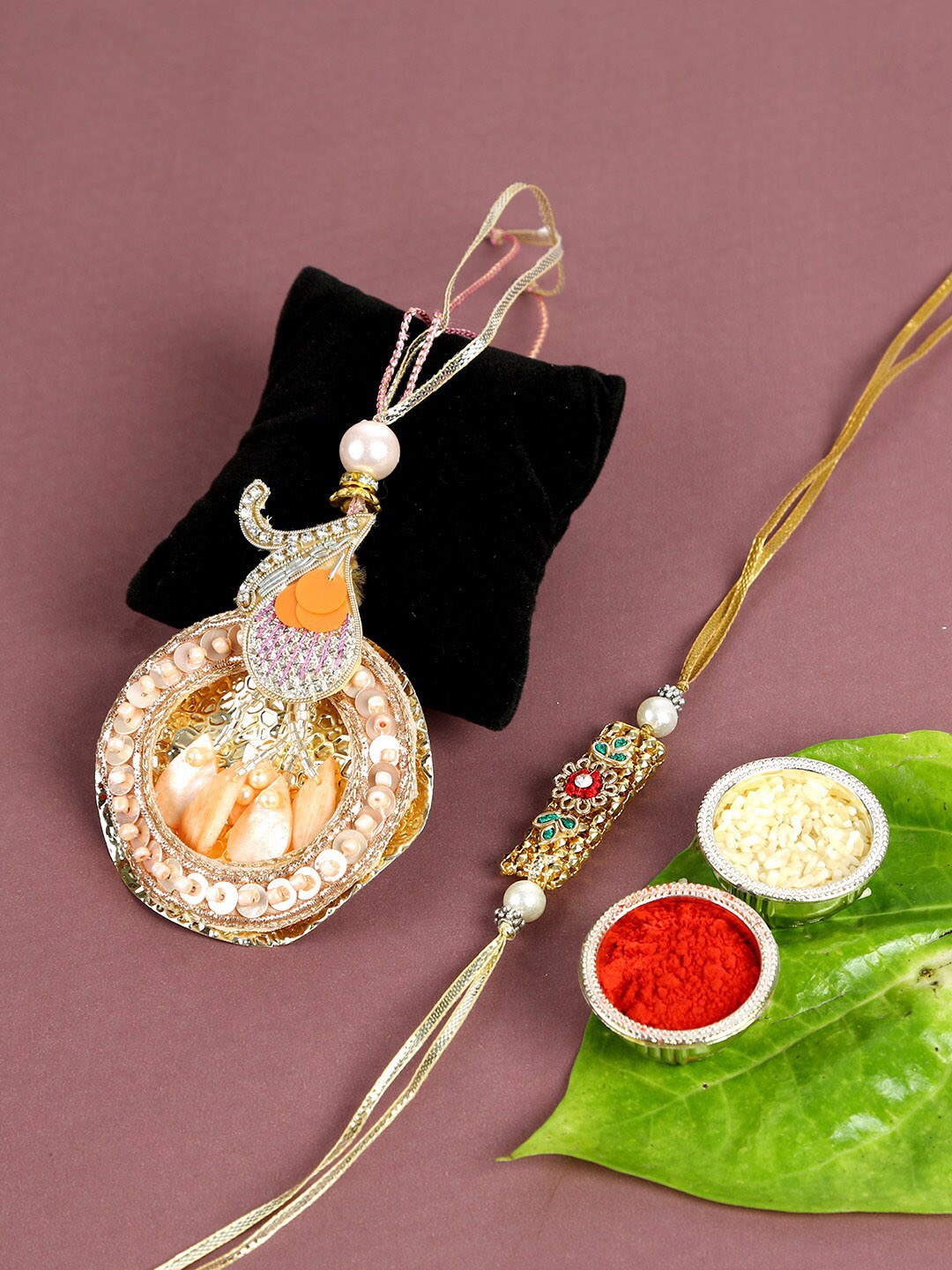 

Aapno Rajasthan Orange & Gold-Toned Bhaiya Bhabhi Handcrafted Rakhi Set