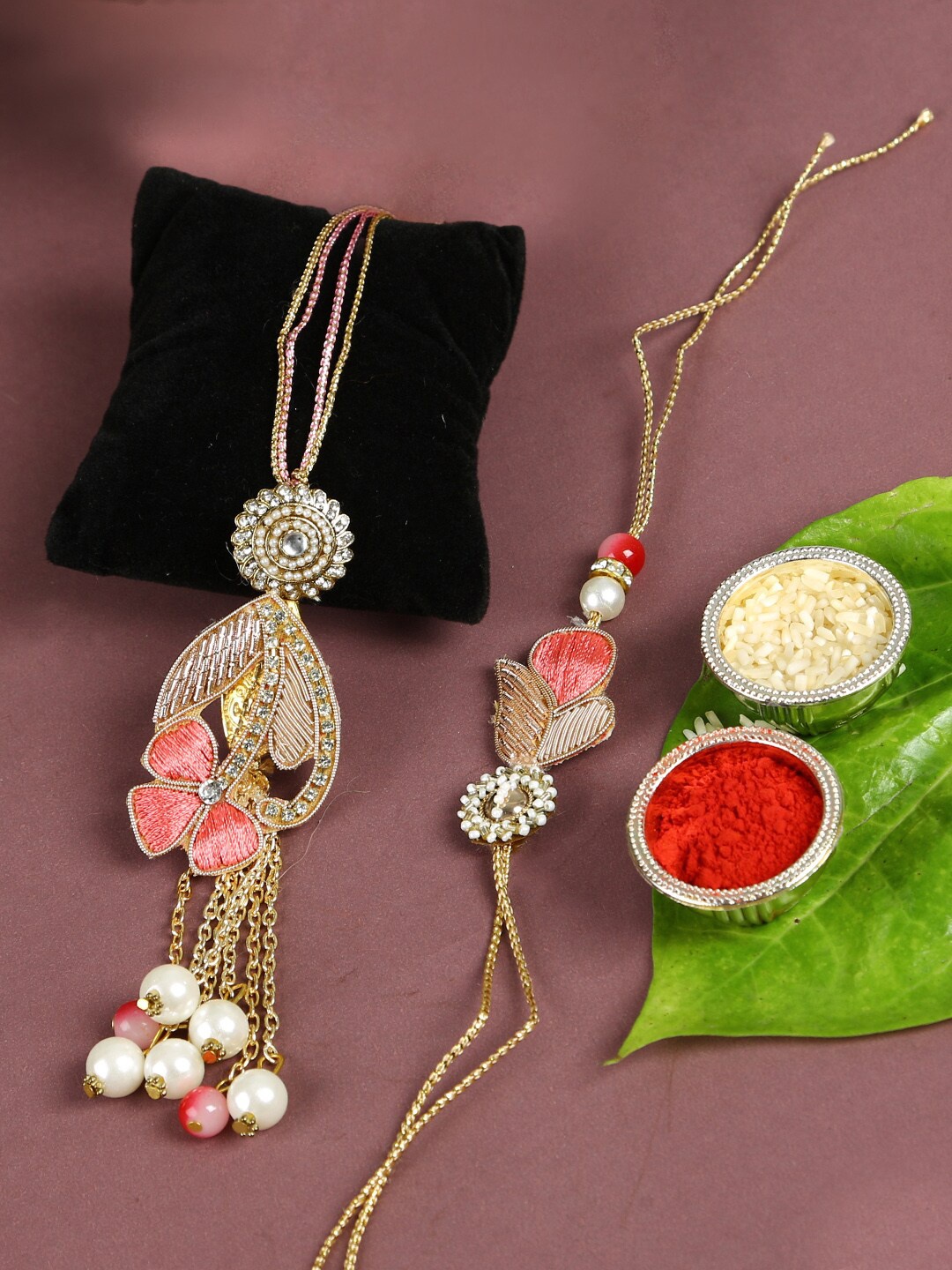 

Aapno Rajasthan Gold-Toned & Pink Zardosi Work Bhaiya Bhabhi Traditional Rakhi Set