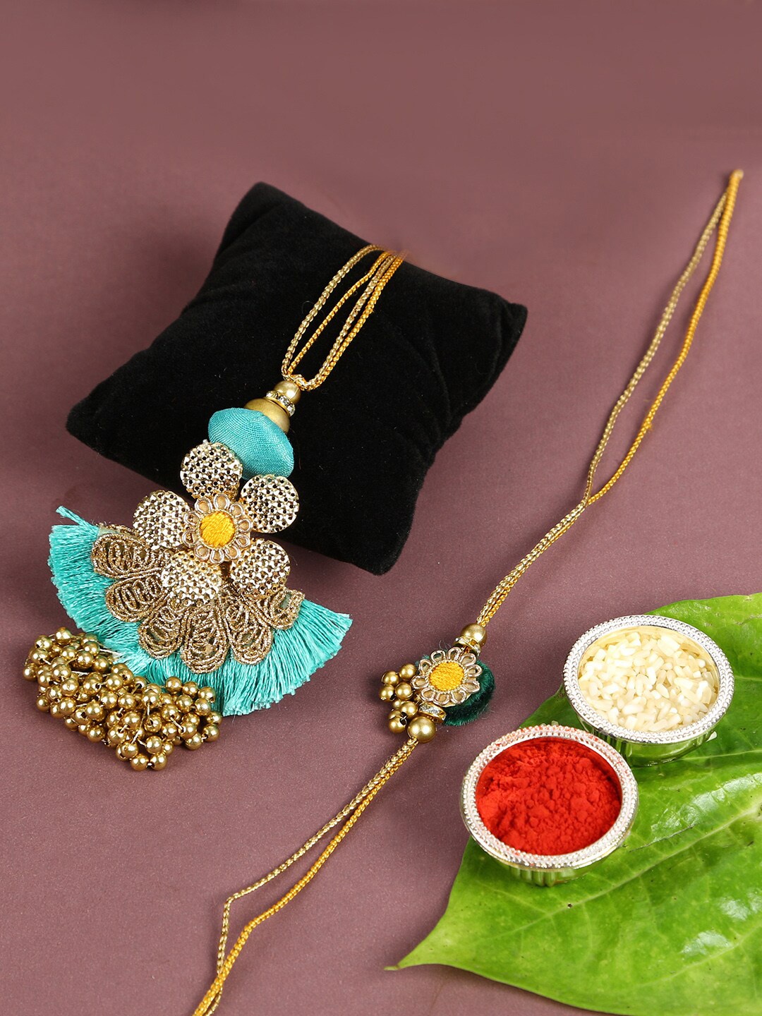 

Aapno Rajasthan Blue & Gold-Toned Bhaiya Bhabhi Traditional Rakhi Set