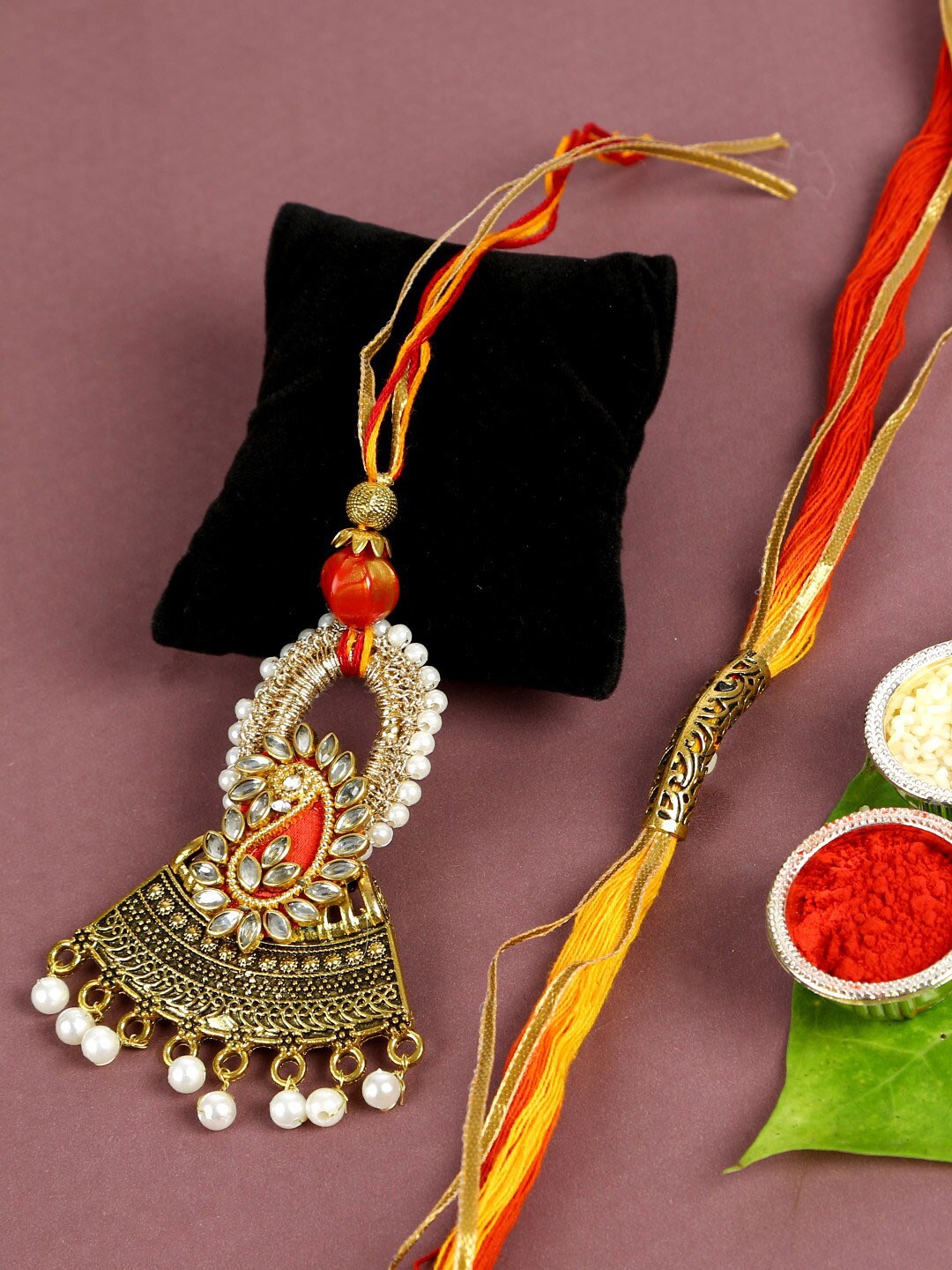 

Aapno Rajasthan Yellow & Gold-Toned Embellished Bhaiya Bhabhi Mauli Rakhi Set