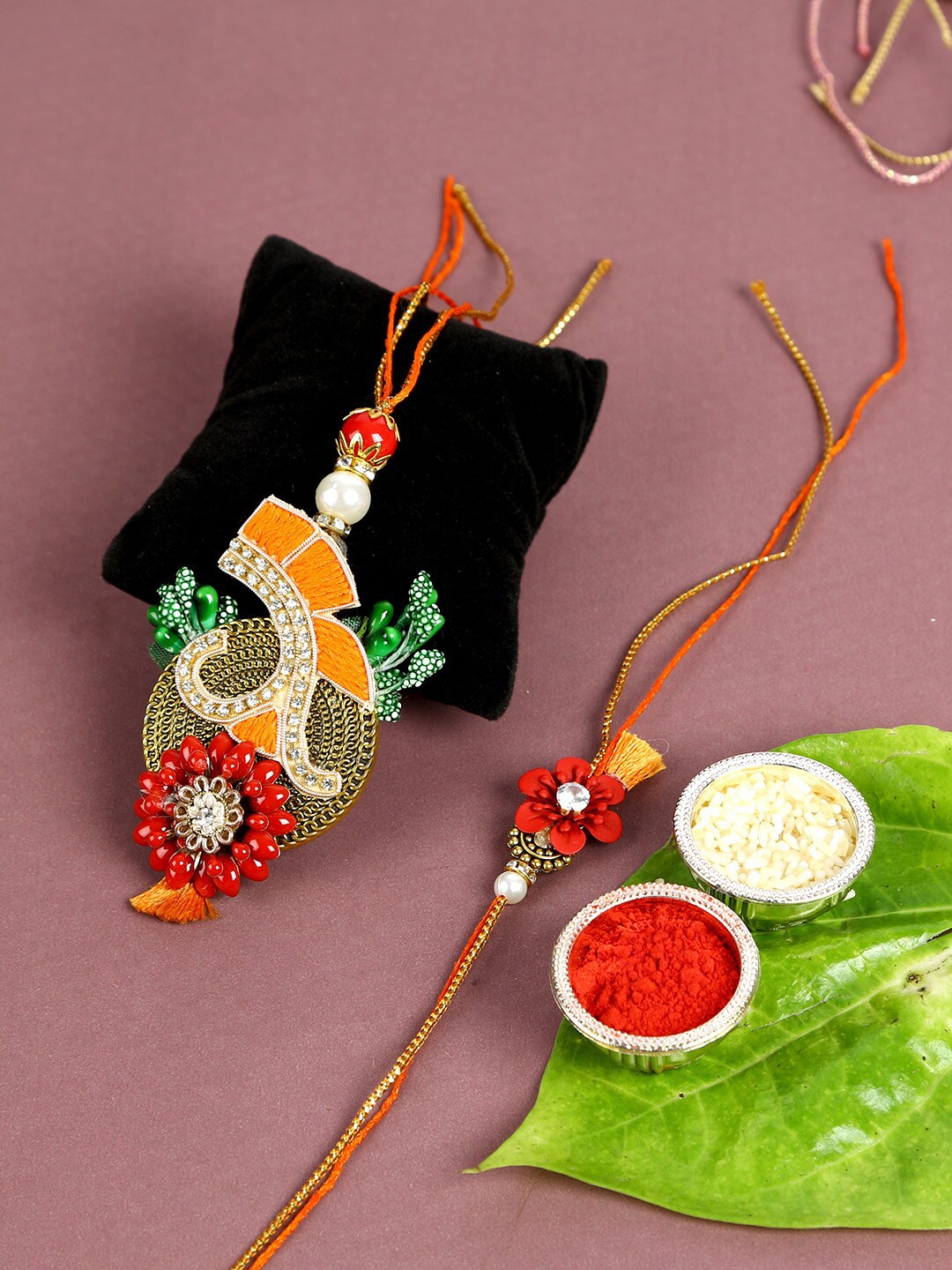 

Aapno Rajasthan Multicoloured Rakhi Gift Set, Multi