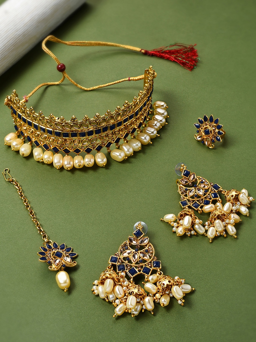 

Zaveri Pearls Gold-Plated Navy Blue & Brown Stone-Studded & Beaded Jewellery Set