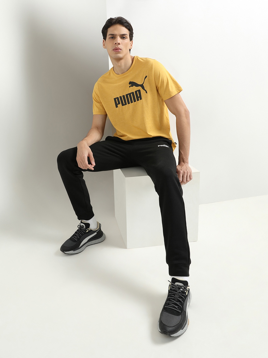 

Puma Men Mustard Yellow & Black Brand Logo Print Essentials Heather T-shirt