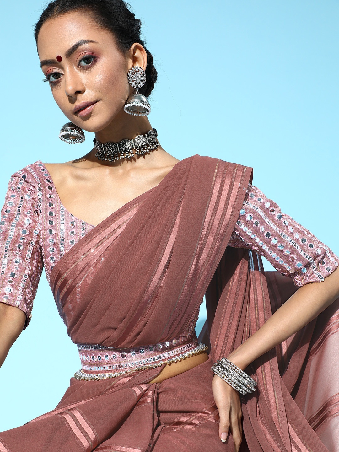 

Saree mall Mauve Striped Poly Georgette Party Wear Saree with Matching Blouse