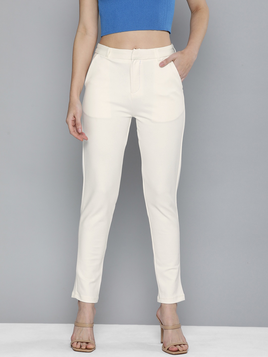 

Tokyo Talkies Women Off White Solid Slim Fit Trousers