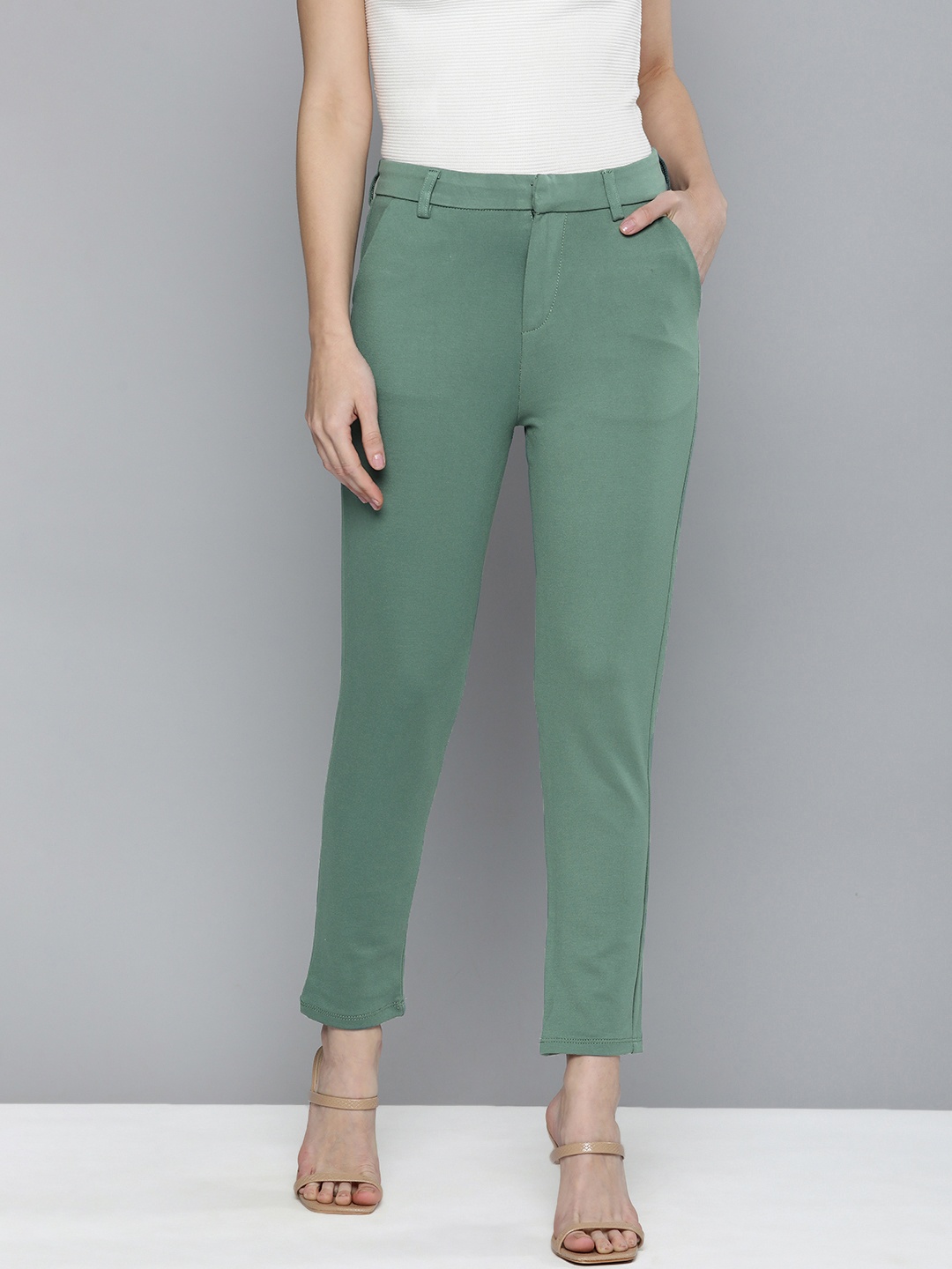 

Tokyo Talkies Women Teal Solid Slim Fit Trousers