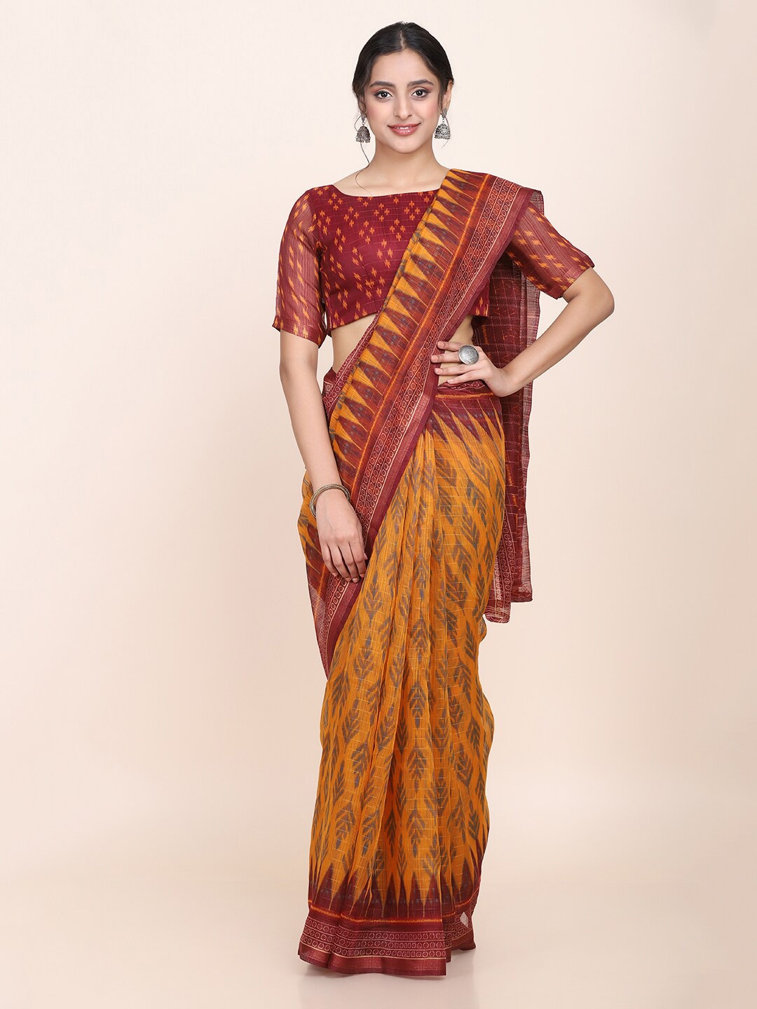 

Shaily Mustard Yellow & Maroon Floral Art Silk Saree