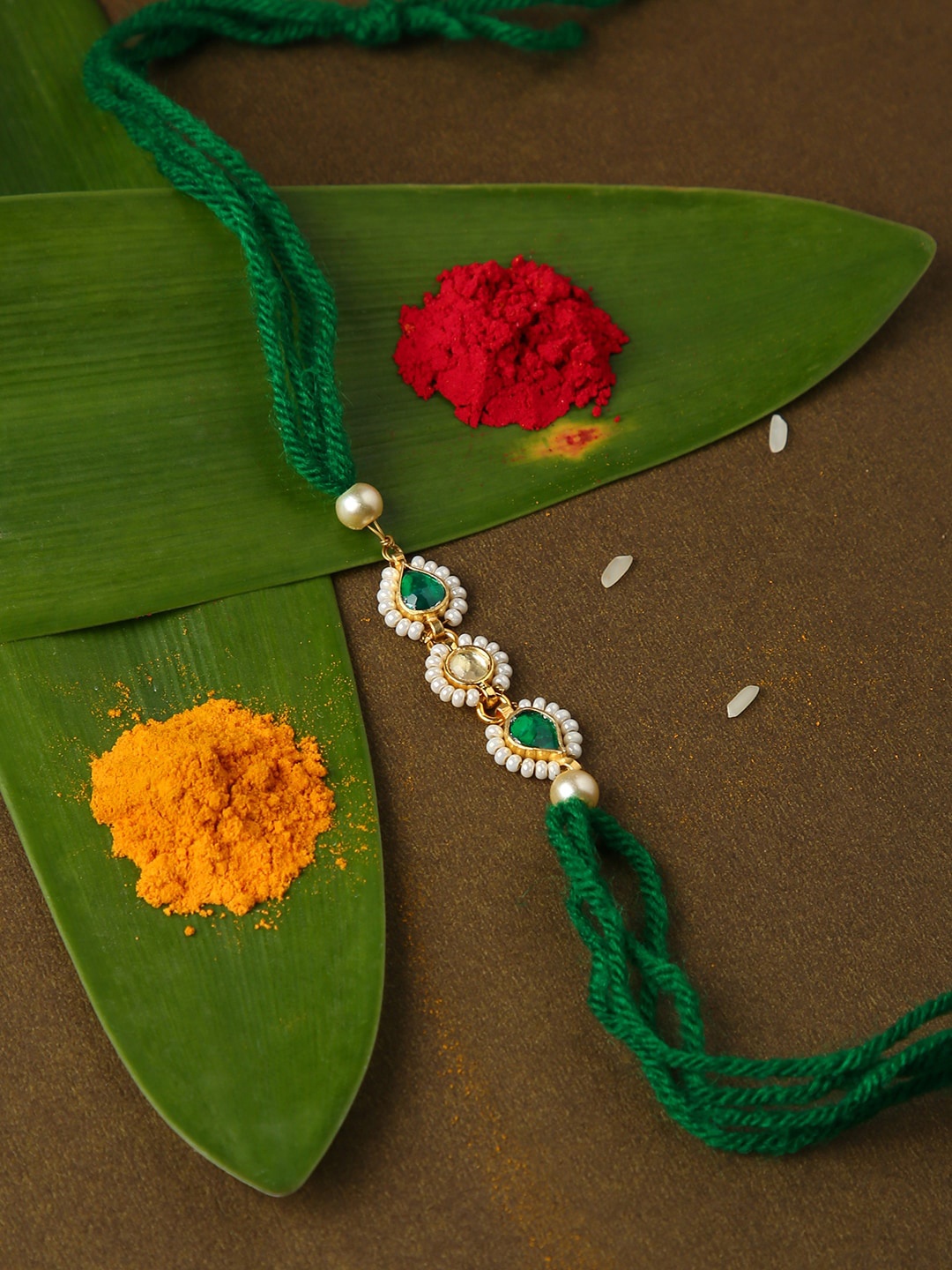 

justpeachy Gold Toned & Green Kundan Rakhi
