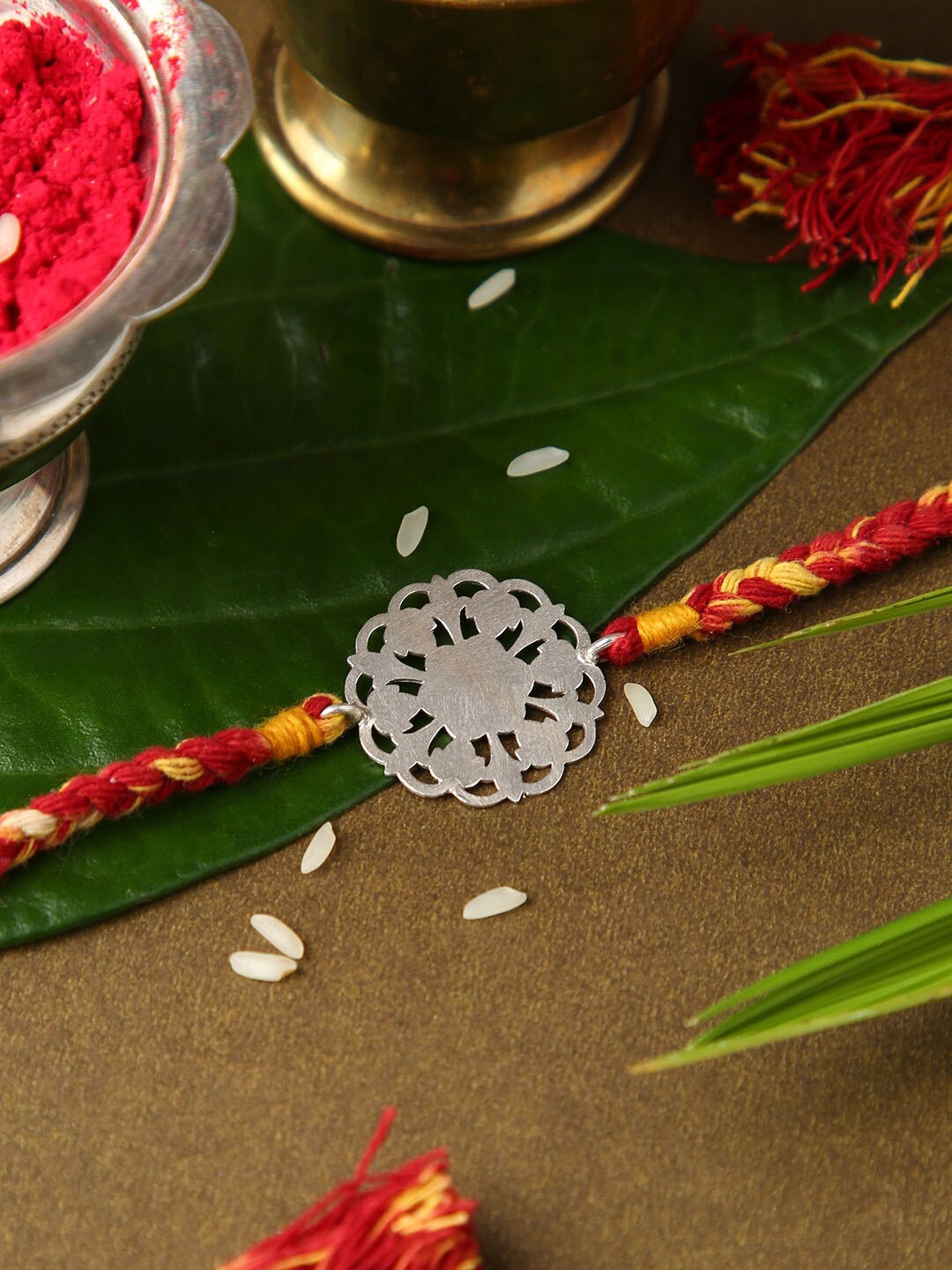 

justpeachy Silver-Toned & Red Rakhi with Roli & Akshada