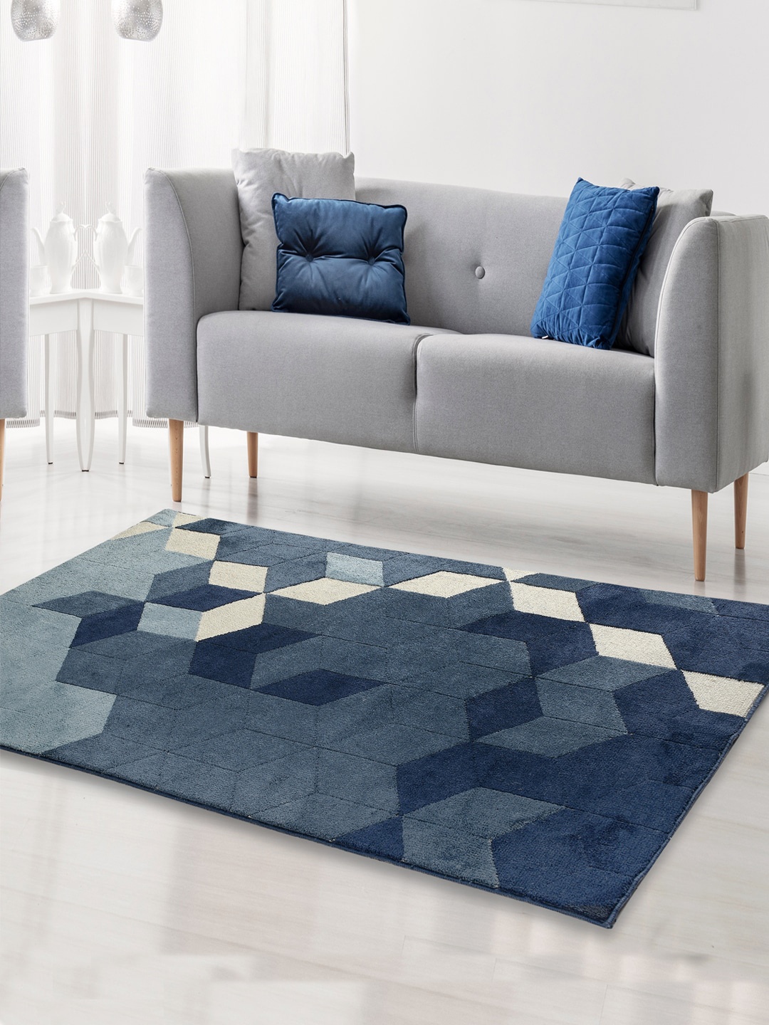 

Saral Home Blue & Beige Geometric Carpet