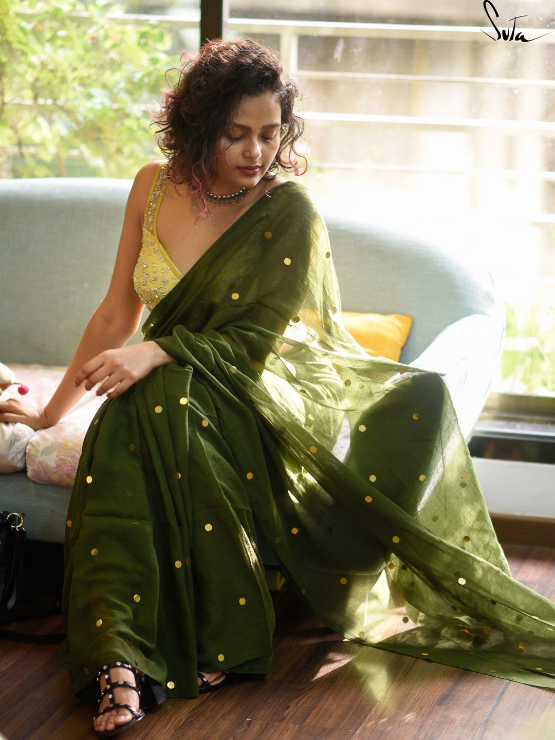 

Suta Olive Green Embellished Sequinned Pure Cotton Saree