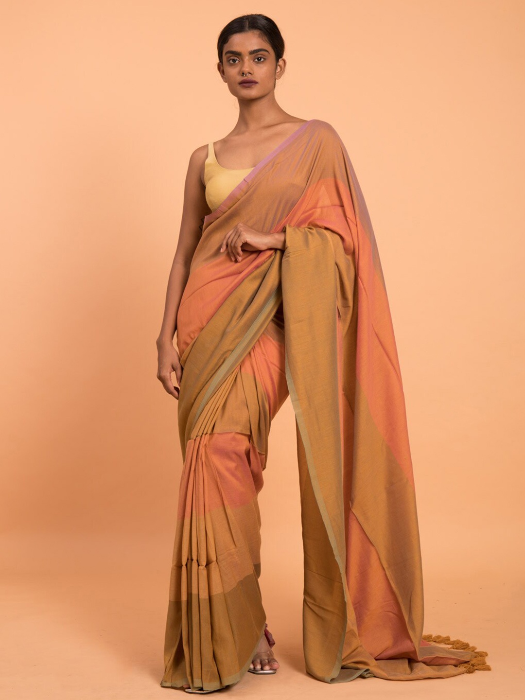 

Suta Orange Brown Colourblocked Cotton Blend Saree