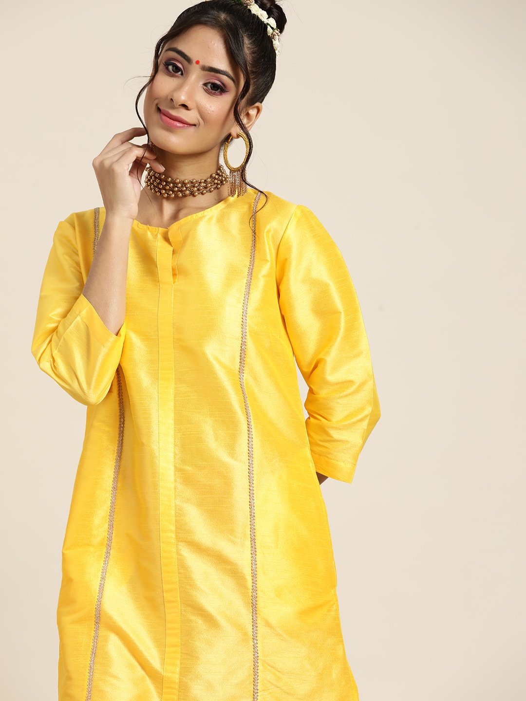 

Sangria Women Yellow & Orange Solid Kurta with Trousers