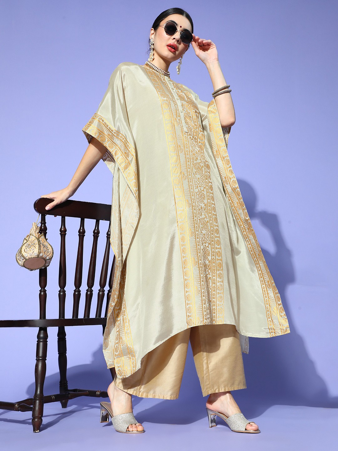

Sangria Women Beige & Golden Ethnic Motifs Printed Extended Sleeves Kaftan Kurta