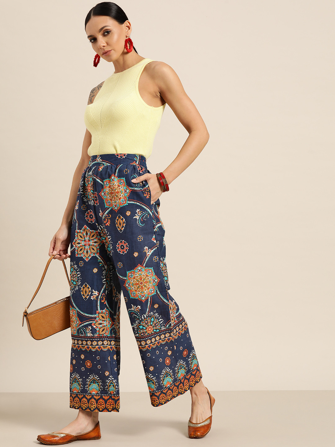 

Sangria Women Blue & Brown Ethnic Motifs Printed Cotton Palazzos