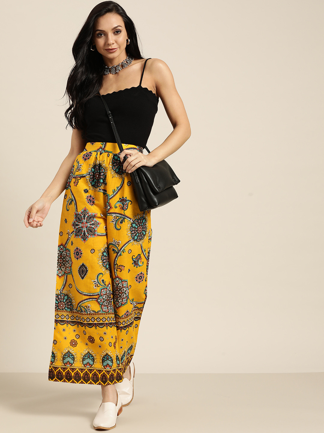 

Sangria Women Yellow Pure Cotton Ethnic Motifs Printed Wide Leg Fit Palazzos