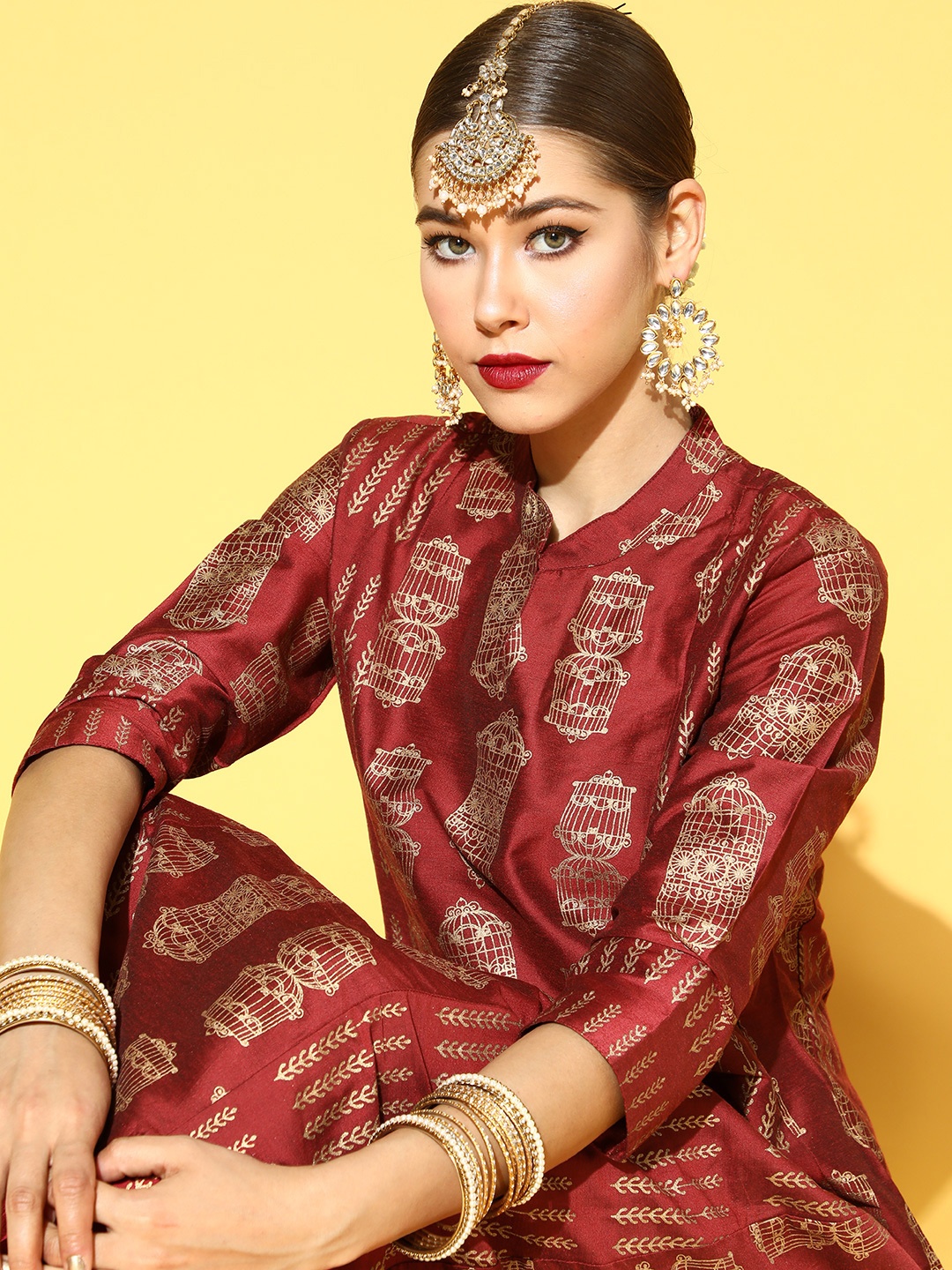 

Sangria Ethnic Motifs Polyester Kurta Set, Maroon