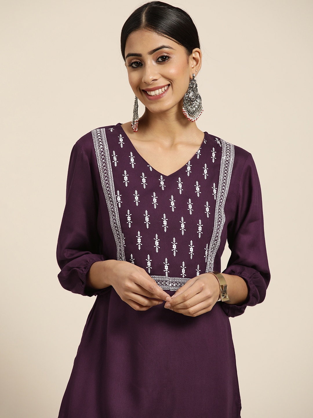 

Sangria Women Burgundy Ethnic Motifs Yoke Design Thread-Work Kurta with Palazzos