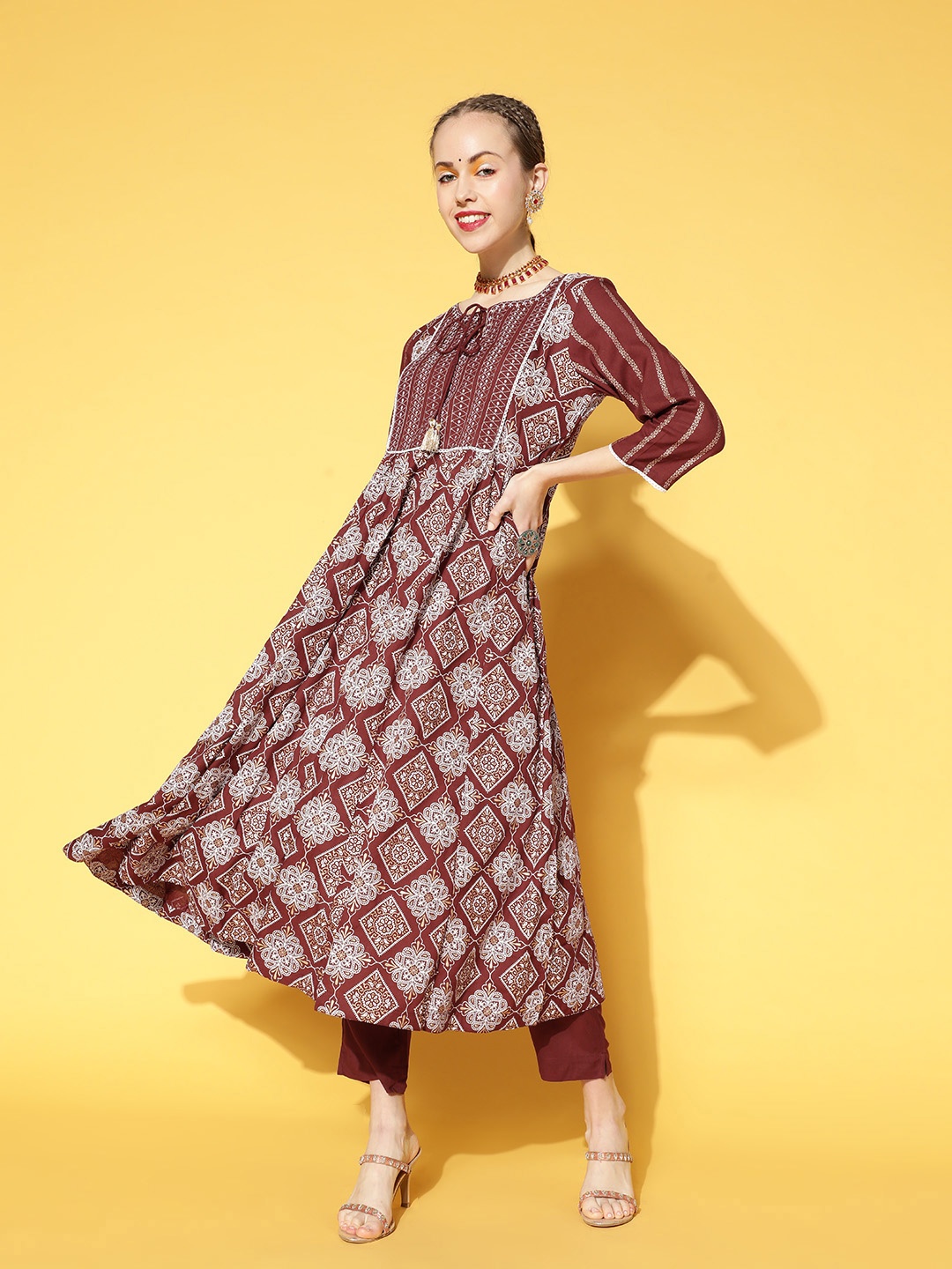 

Sangria Ethnic Motifs Viscose Rayon Swirling Volume Kurta Set, Maroon