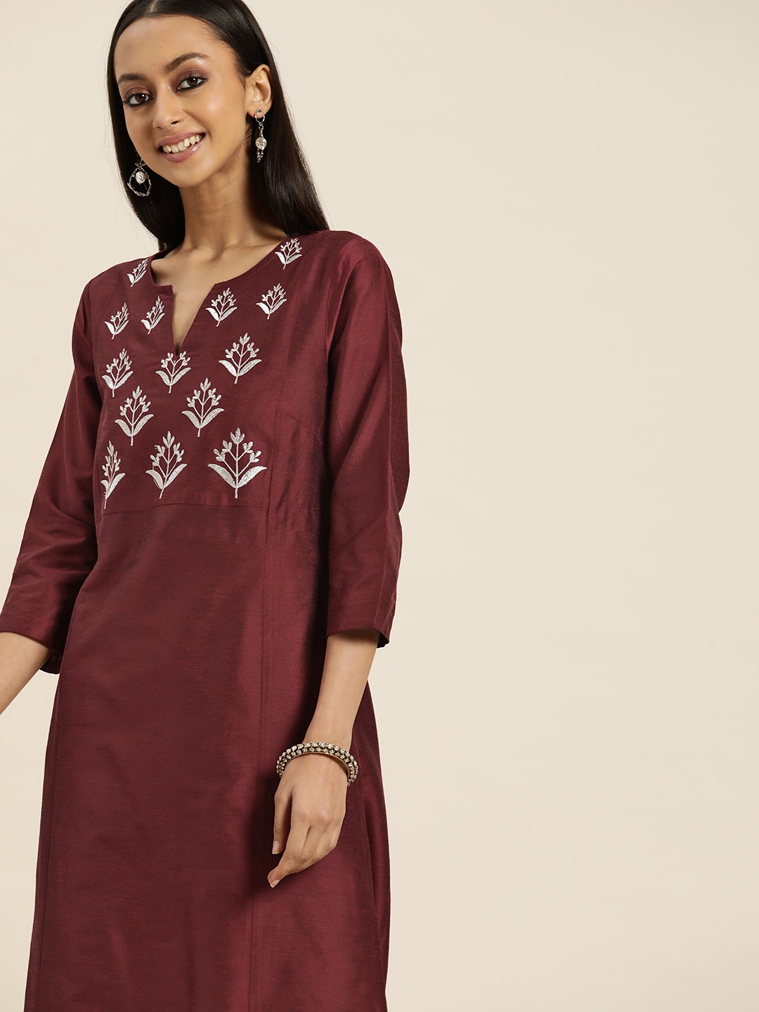 

Sangria Women Maroon Ethnic Motifs Yoke Design Regular Kurta with Trousers