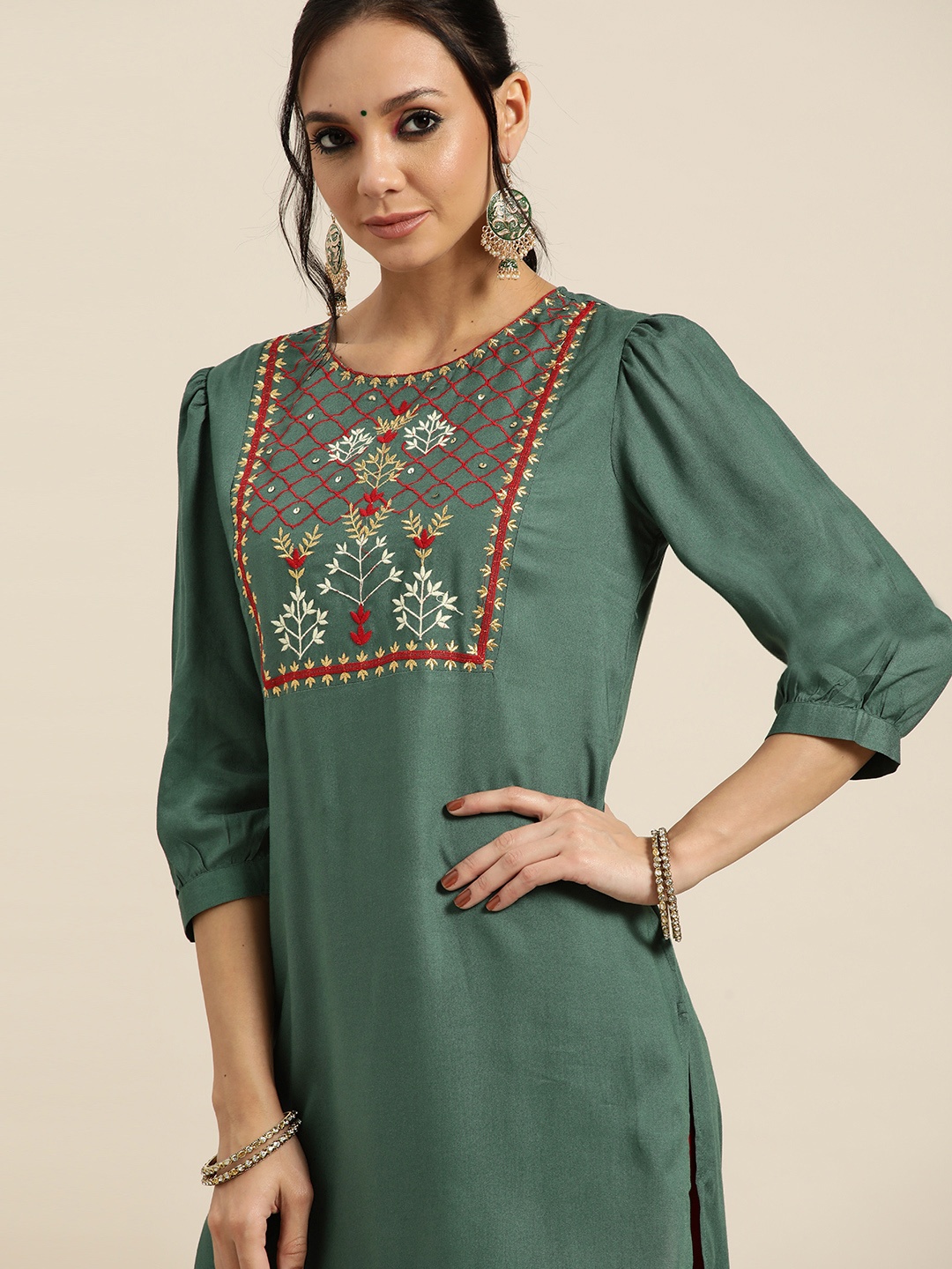 

Sangria Women Green & Red Ethnic Motifs Yoke Design Thread Work Kurta