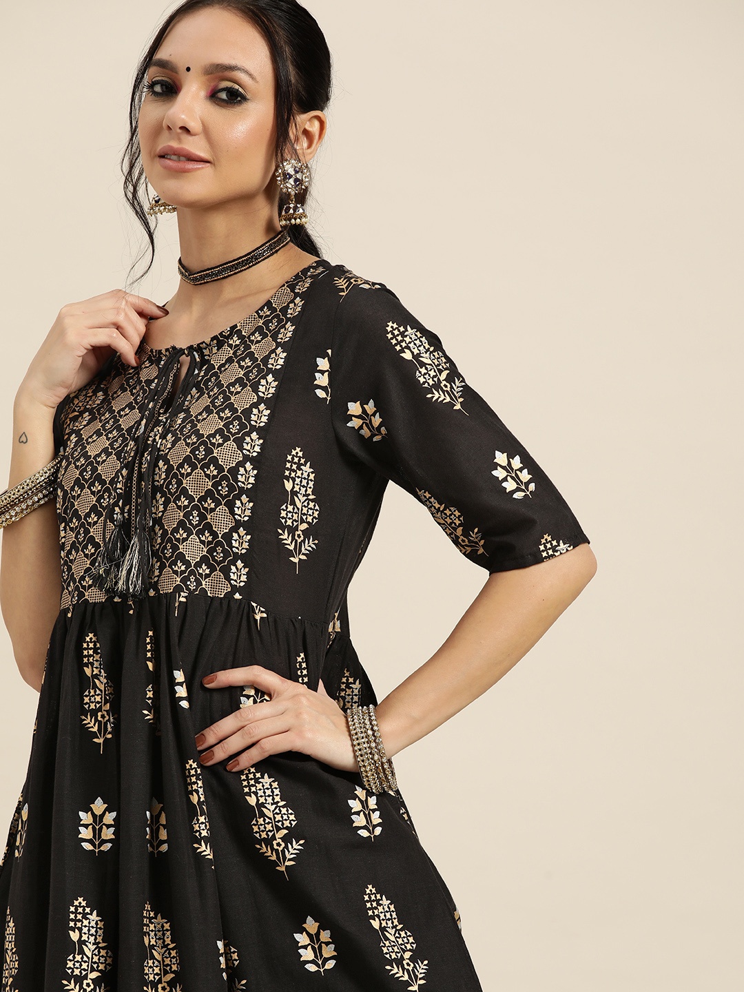 

Sangria Women Black & Golden Ethnic Motifs Printed Kurta