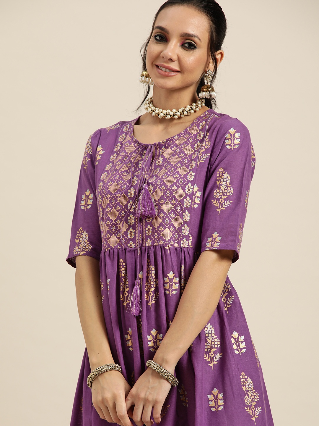 

Sangria Women Purple & Golden Ethnic Motifs Printed Kurta