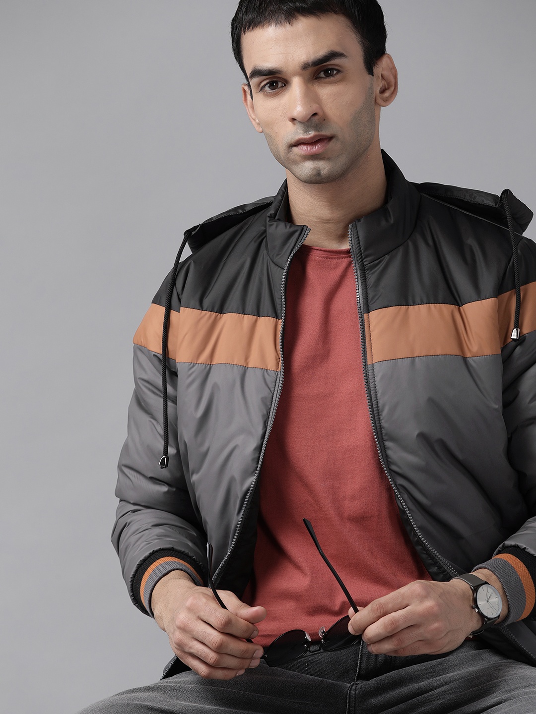 

Roadster Men Charcoal Grey & Rust Brown Striped Padded Jacket